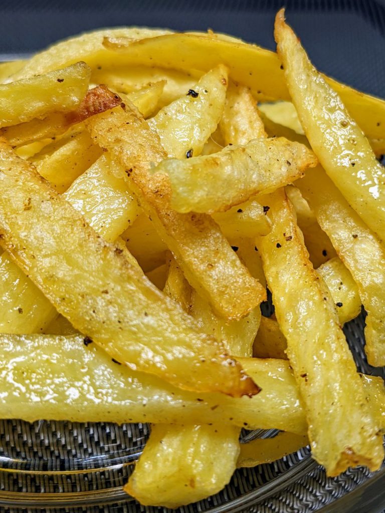 A simple recipe for the crispiest air fryer fries that are perfectly seasoned